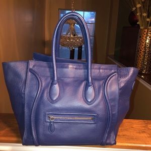 I am selling a navy blue Celine luggage tote